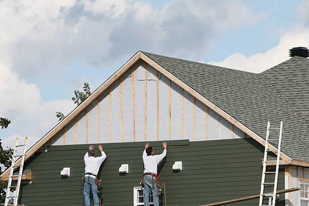 Professional Siding technician working in Senoia, GA